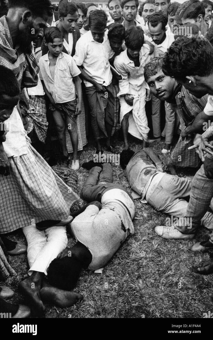 During victory rally in Dacca stadium the Mukti Bahini bayonet to death 4 young men Collaboraters  Stock Photo