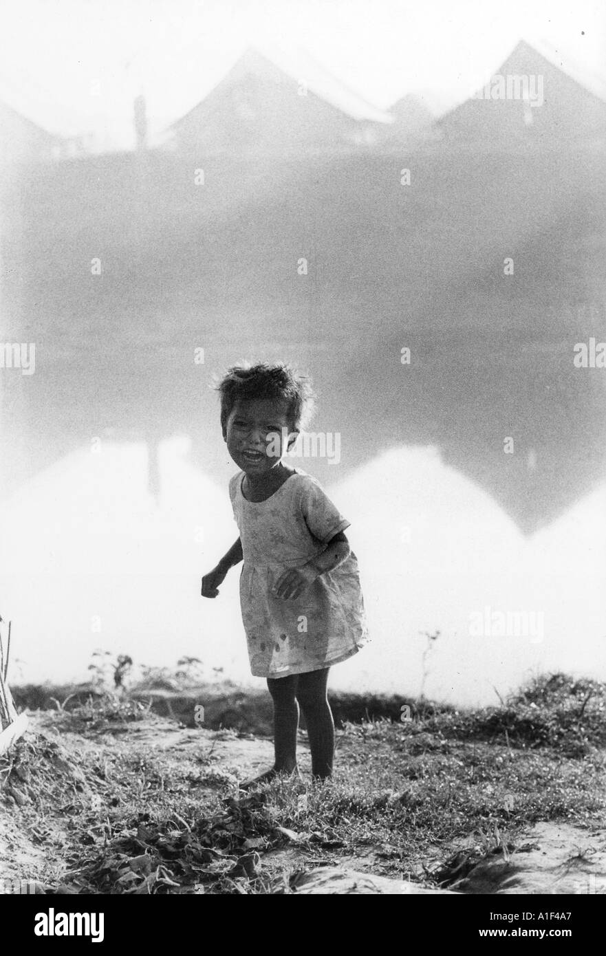 Bengali child lost in a refugee camp in India having feld the war in Bangladesh Stock Photo