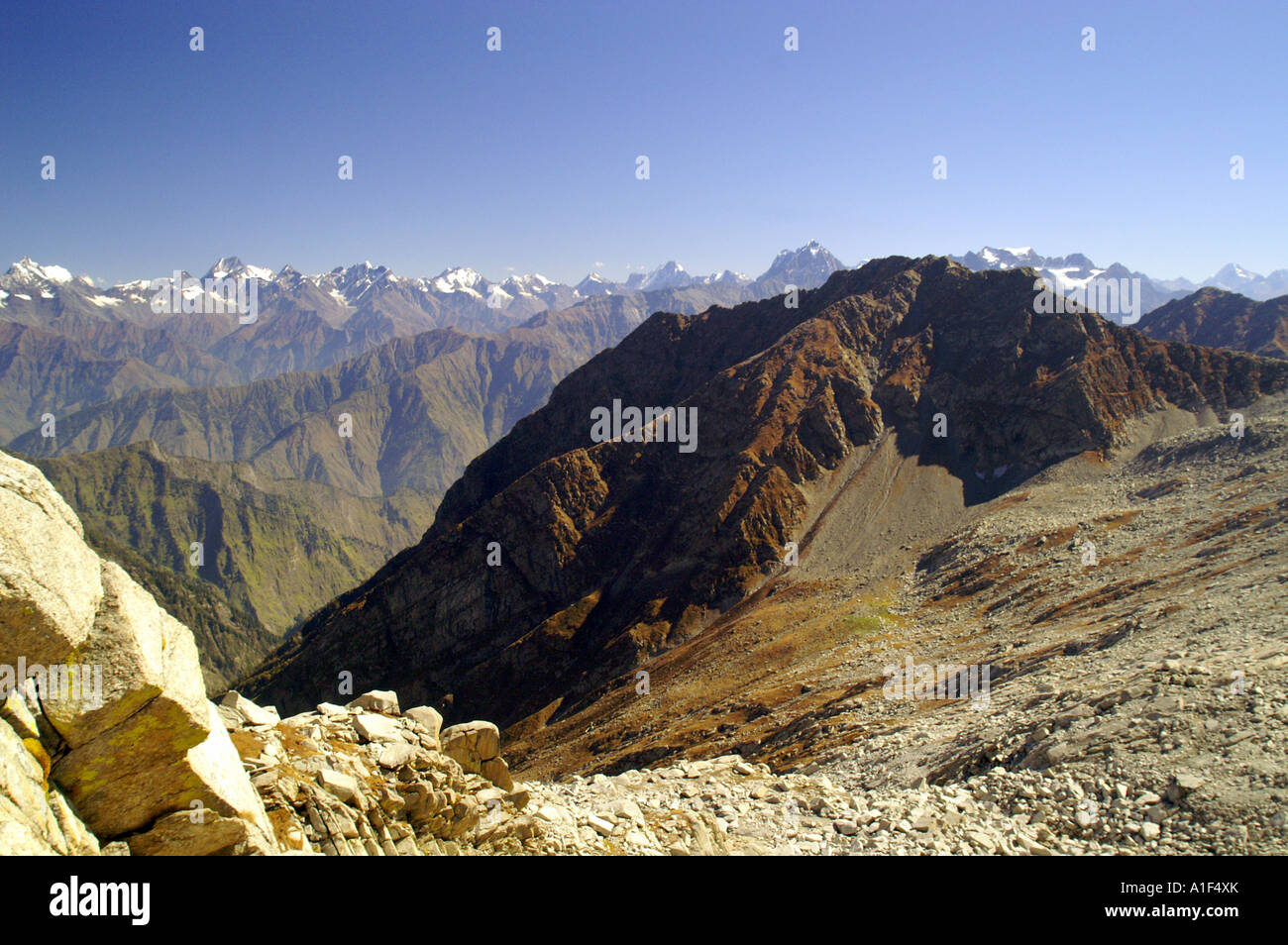 View of Chamba Valley and Pir Panjal range of Indian Himalaya from Indrahar pass 4375m Stock Photo