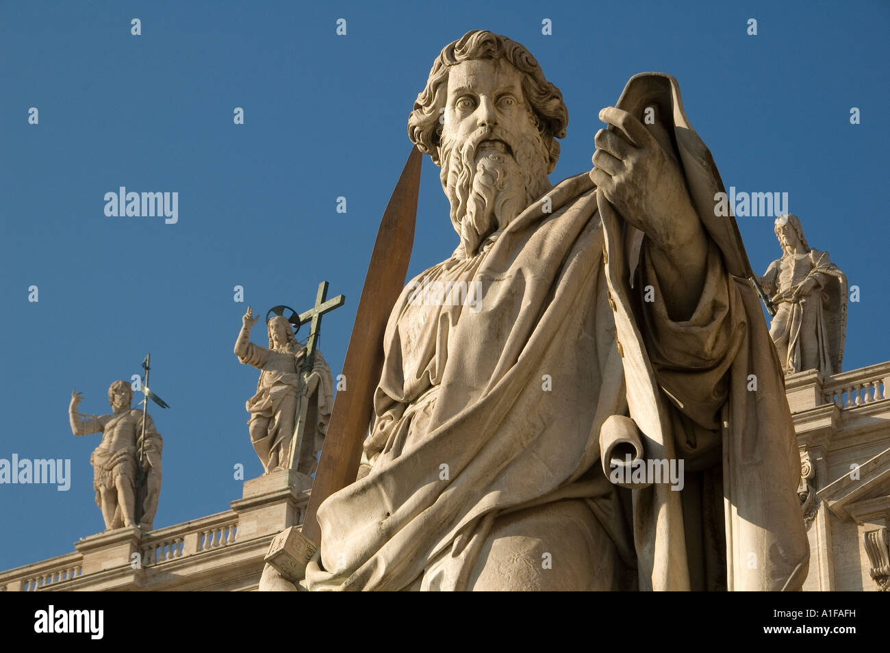 Statue of Apostle Paul with a sword at Piazza San Pietro with St Stock