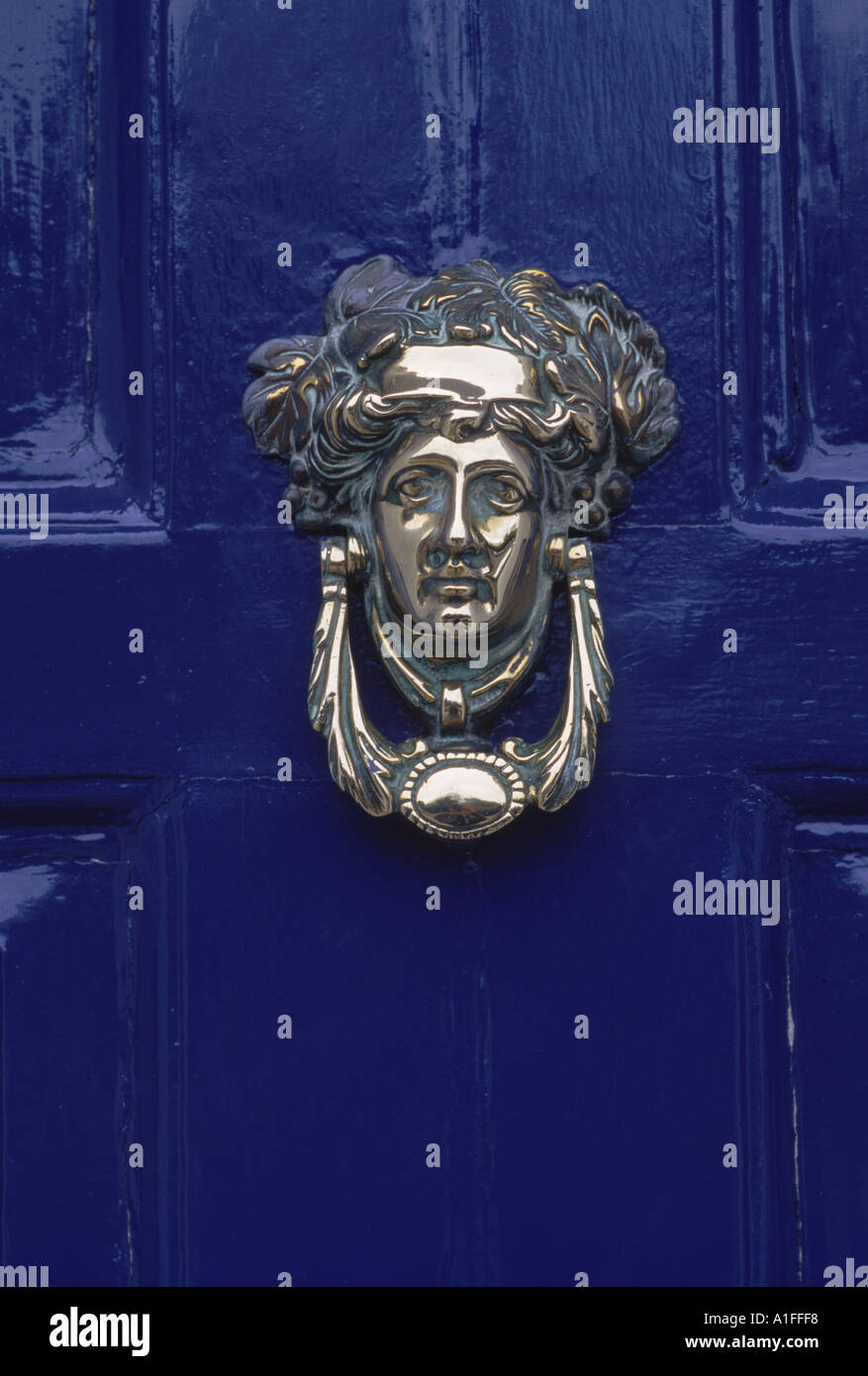 Blue painted door and knocker in the centre of the city of Dublin Eire G Hellier Stock Photo