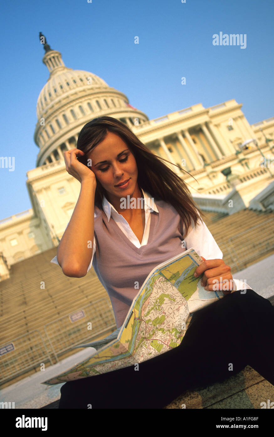 Tourist looking at a Map Washington DC USA Model Released Stock Photo