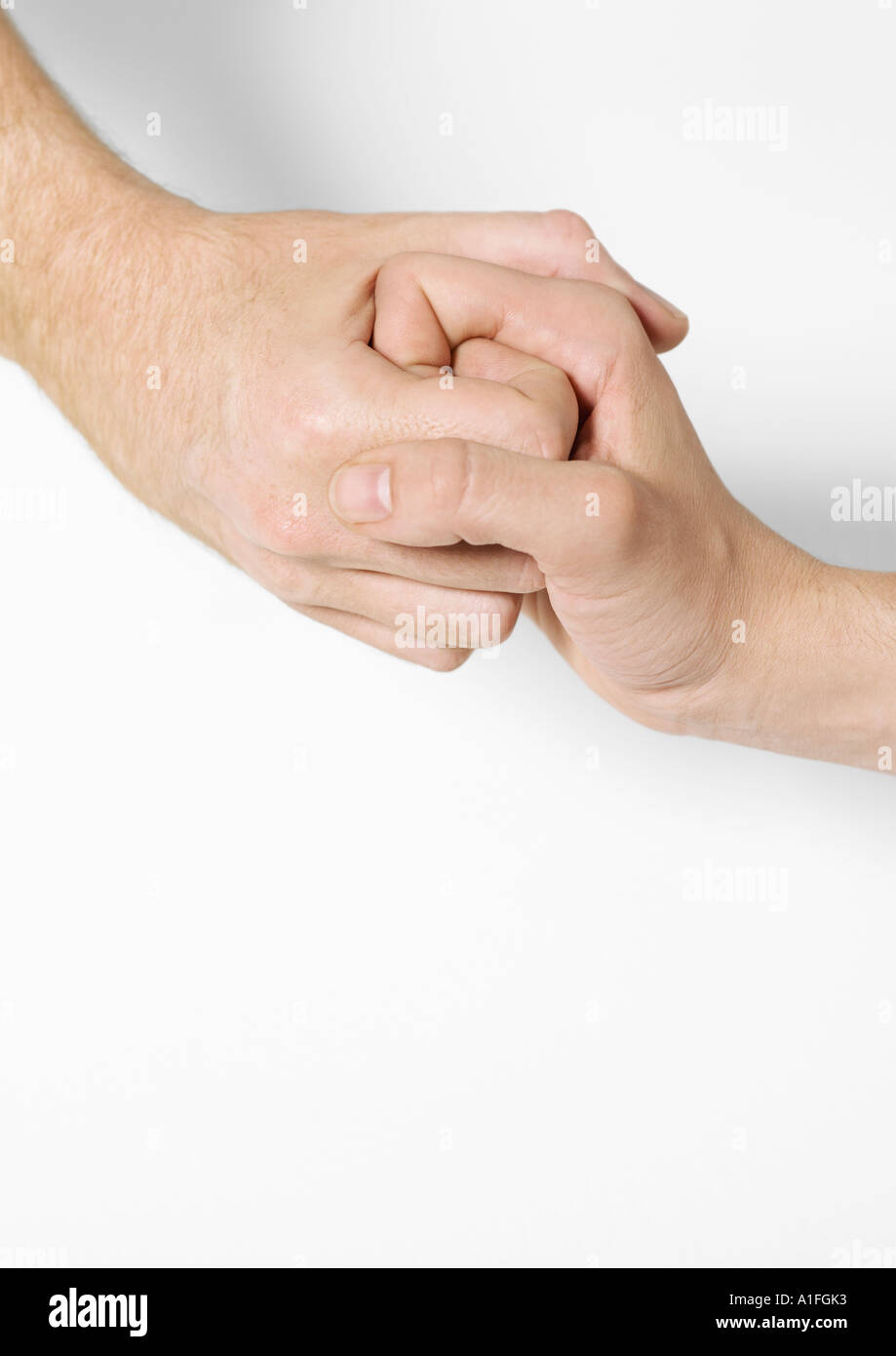 Clasped hands Stock Photo