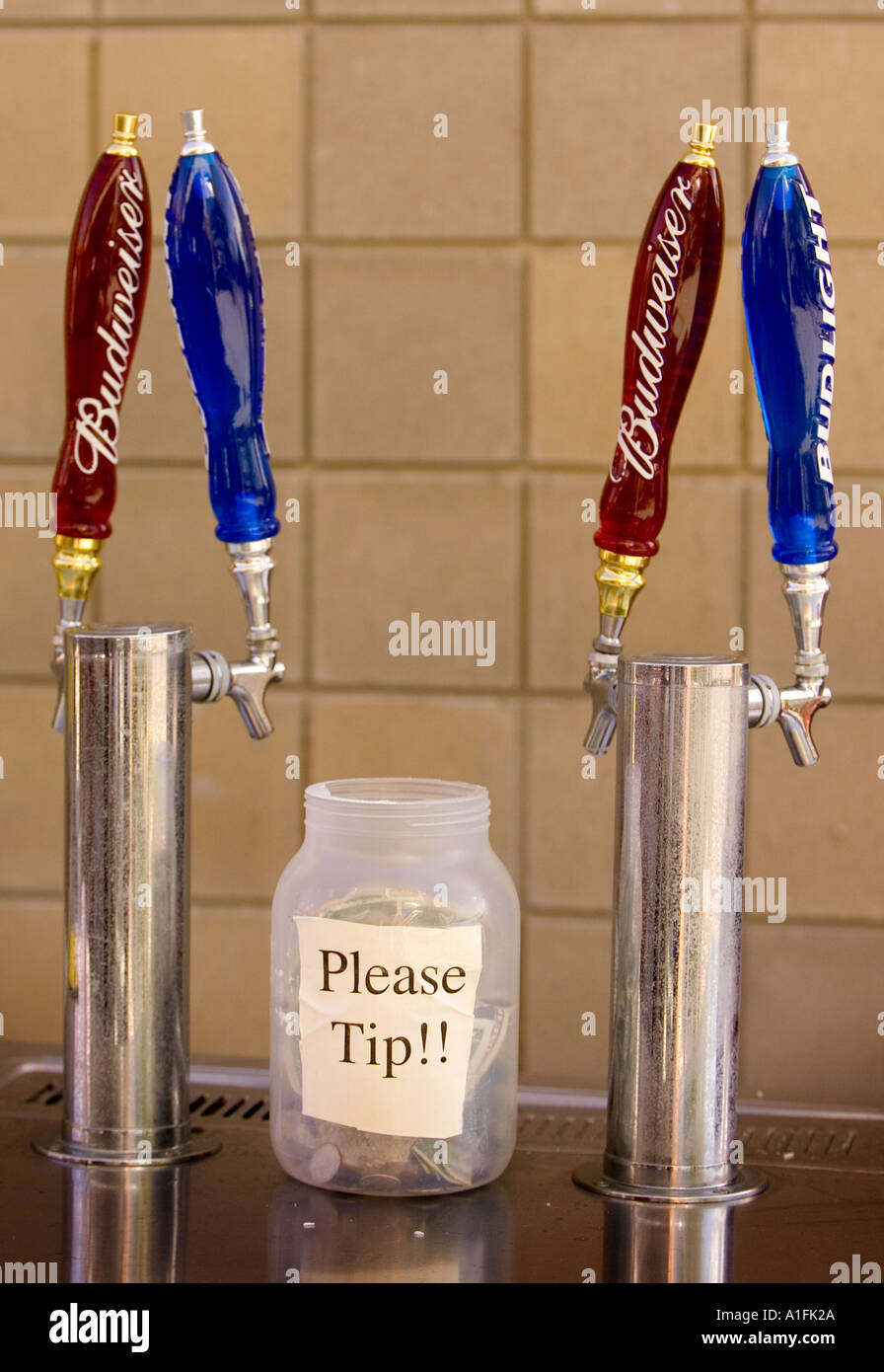 Beer taps at an outdoor stand Stock Photo Alamy