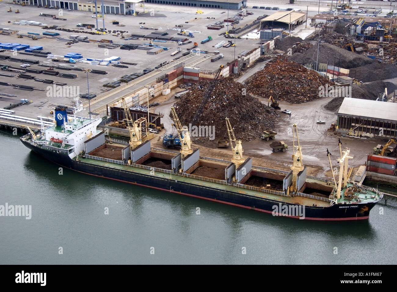 Scrap metal being loaded to a ship for export at the Port of Long Stock