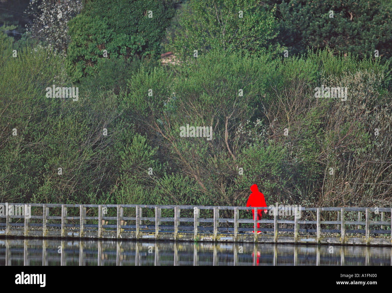 Walker in red hi-res stock photography and images - Alamy