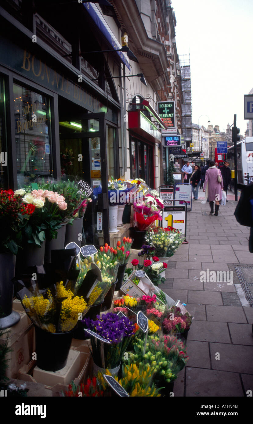 Flower shop and pedestrians Southampton Row London Stock Photo