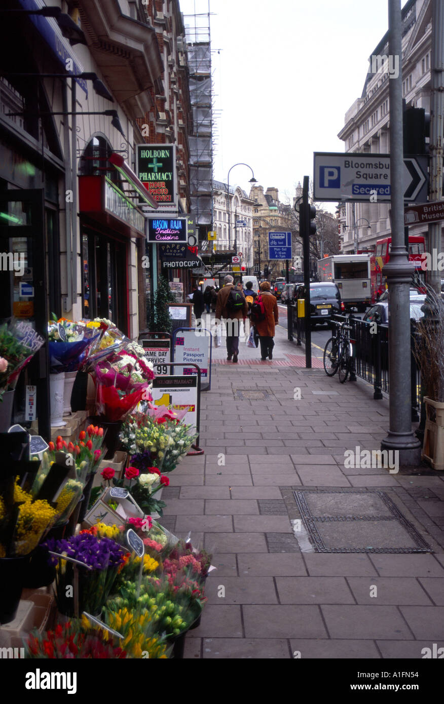 Flower shop and pedestrians Southampton Row, London, England, UK Stock Photo