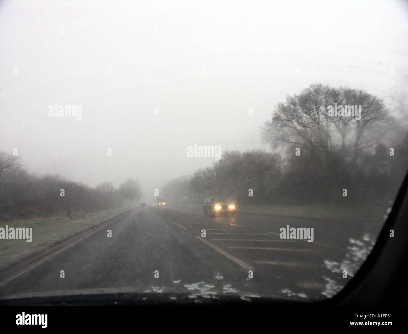 Driving in rain hi-res stock photography and images - Alamy