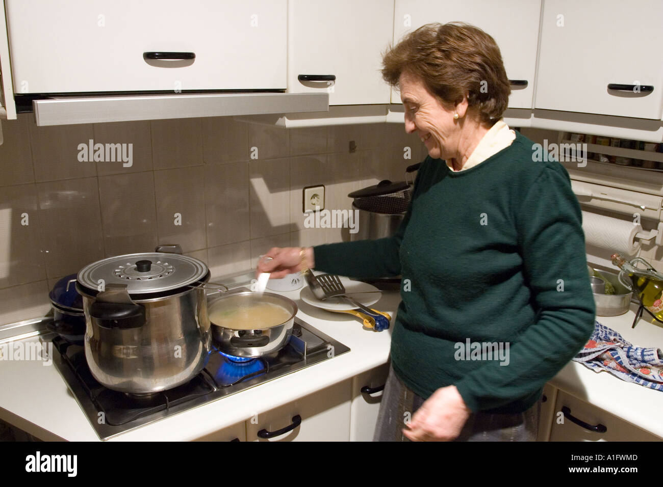 Housewife with cooking pot hi-res stock photography and images - Alamy