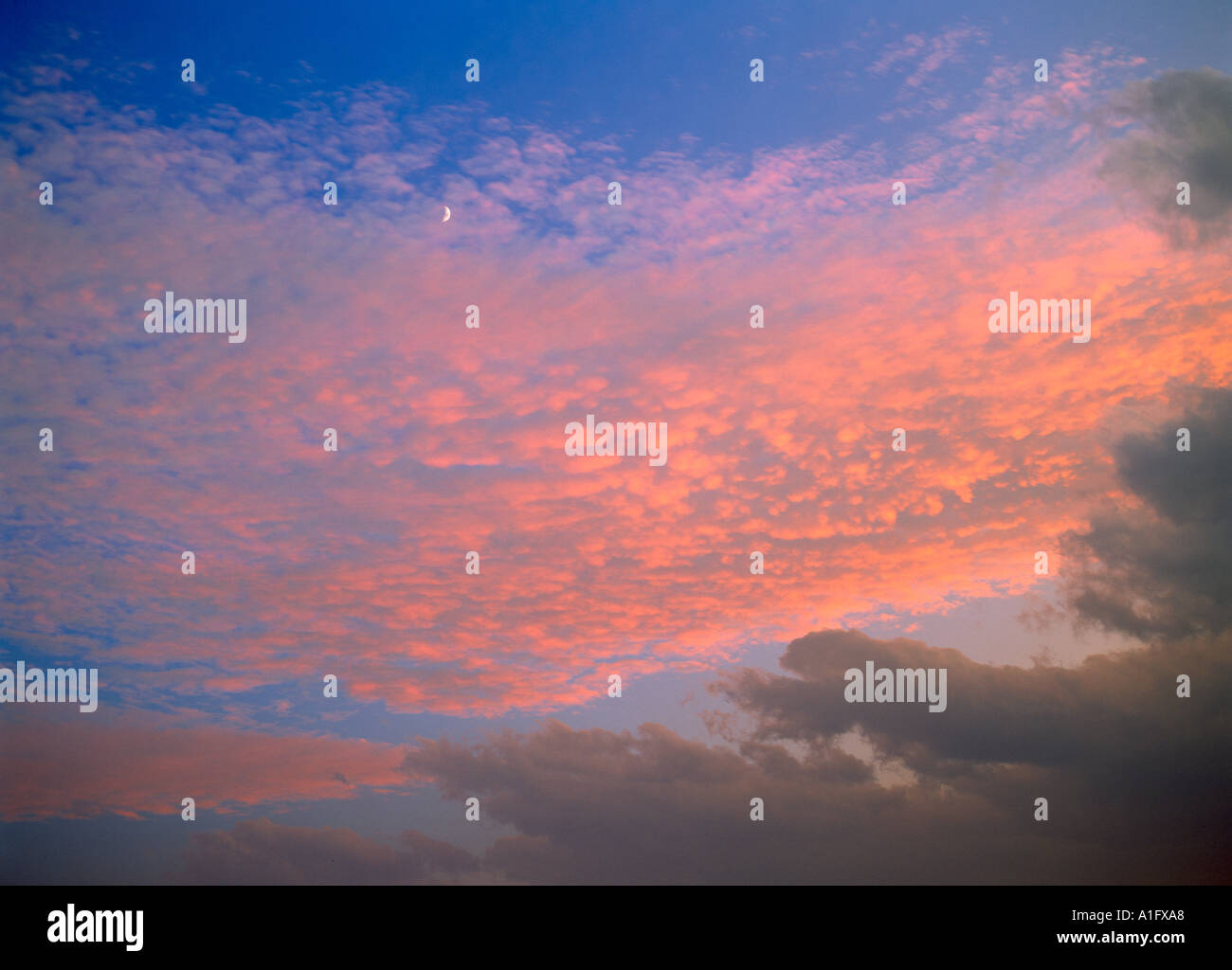 Sunset clouds and moon near Sedona AZ Stock Photo