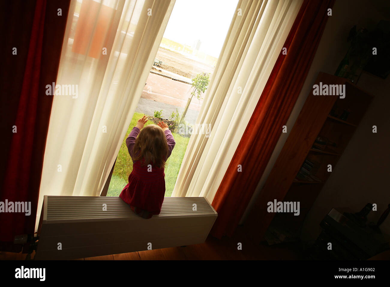 Girl sitting stool back hi-res stock photography and images - Alamy