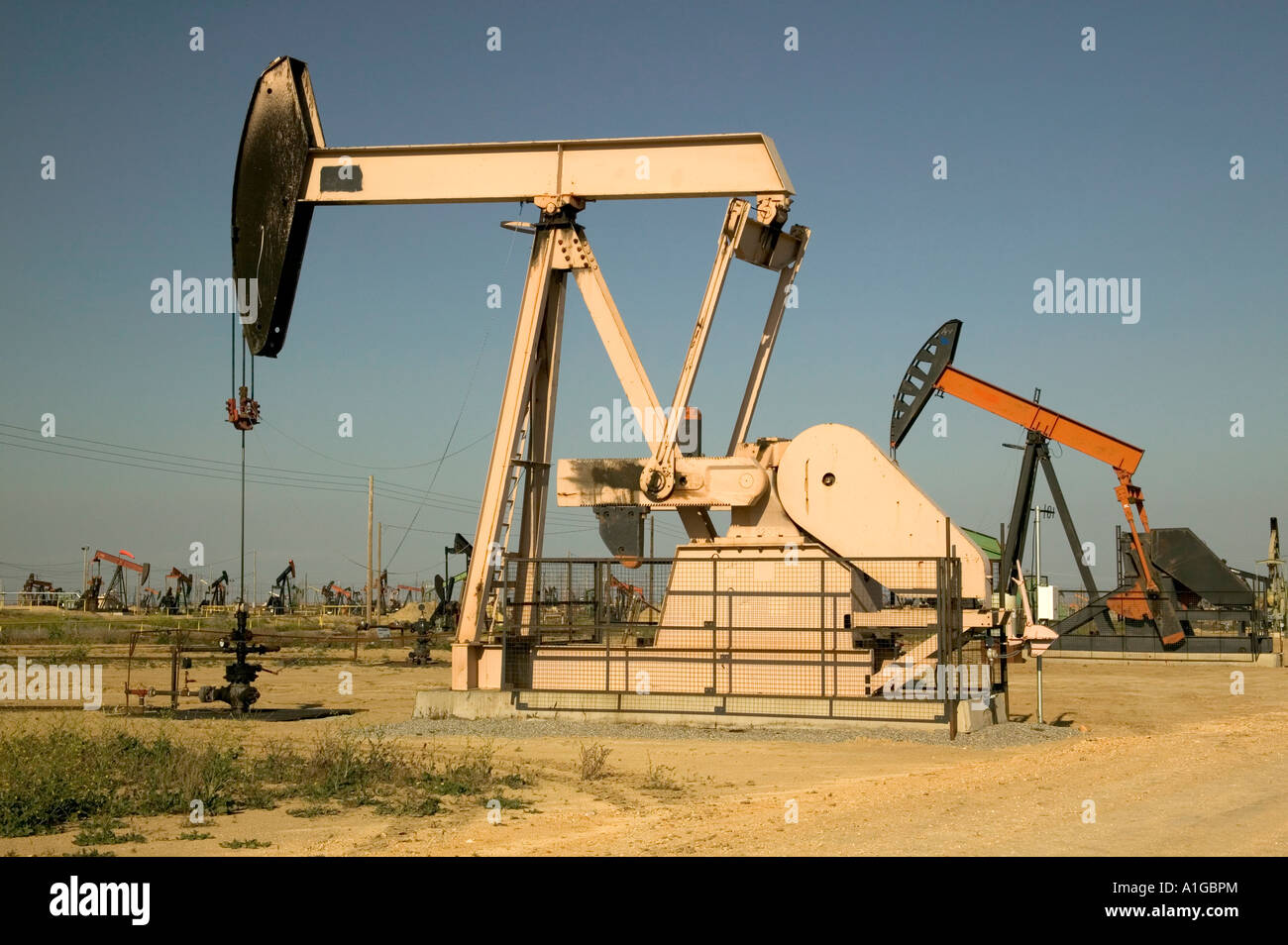 Nodding donkey oil pumps operating, California Stock Photo Alamy