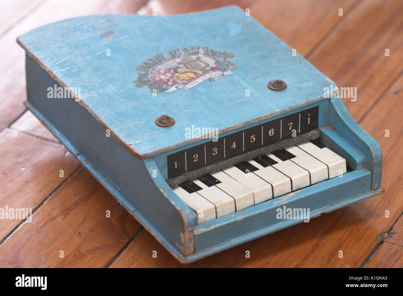 small wooden toy piano Stock Photo - Alamy