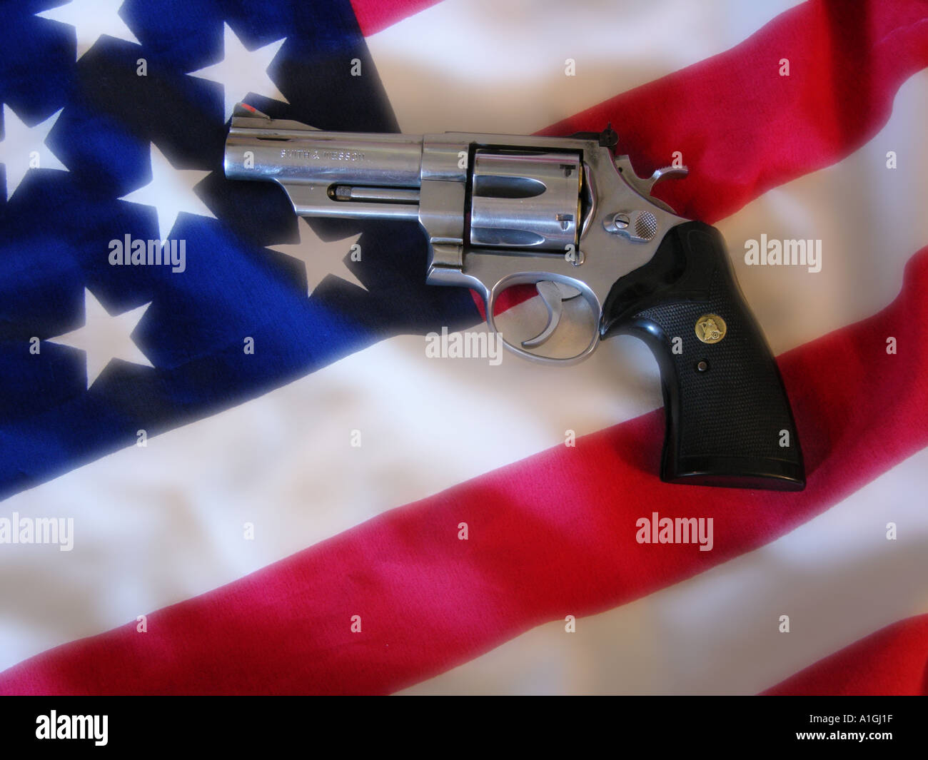 American Flag and Revolver Stock Photo