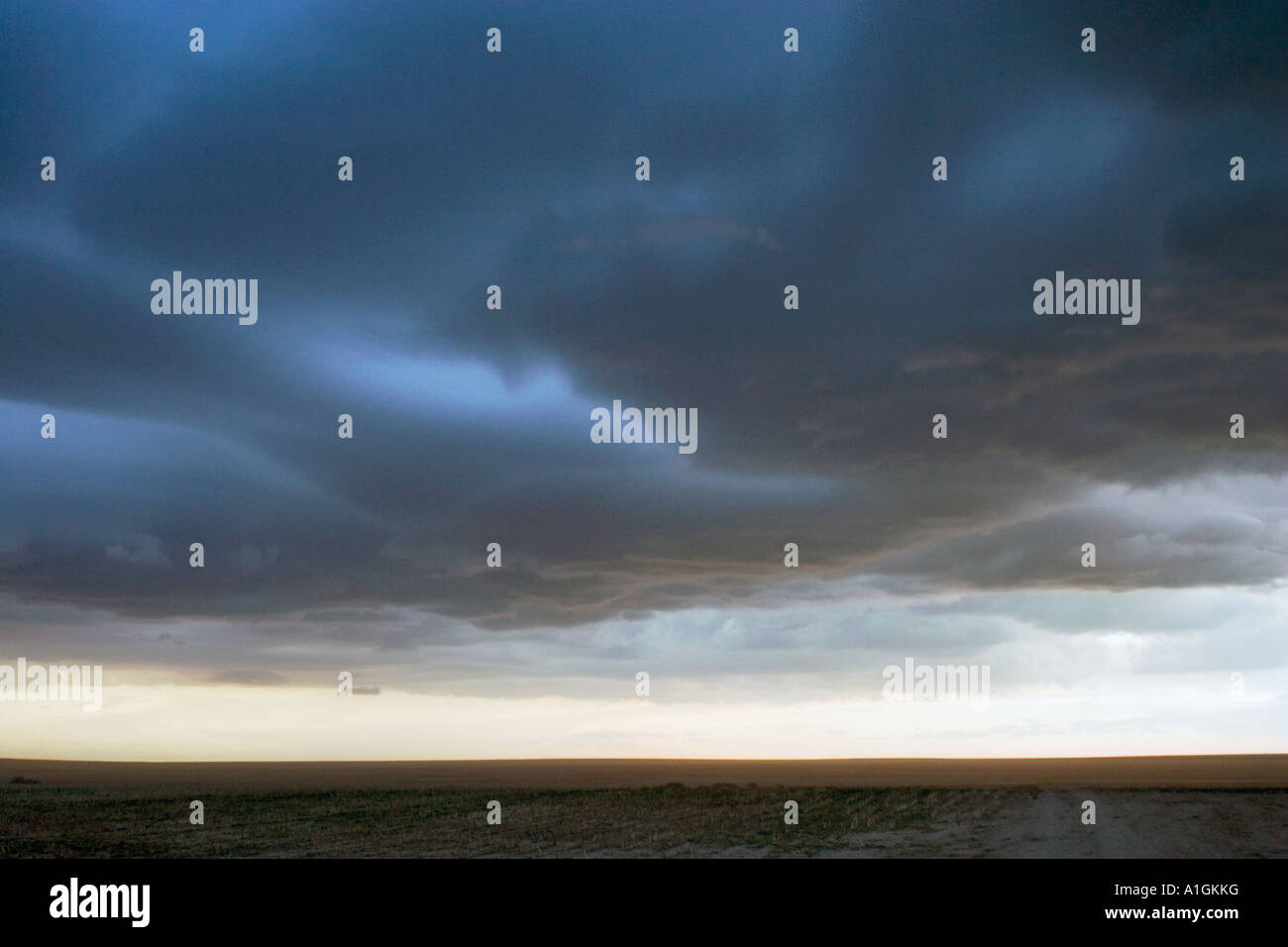 Dark menacing storm clouds over Colorado field USA Stock Photo