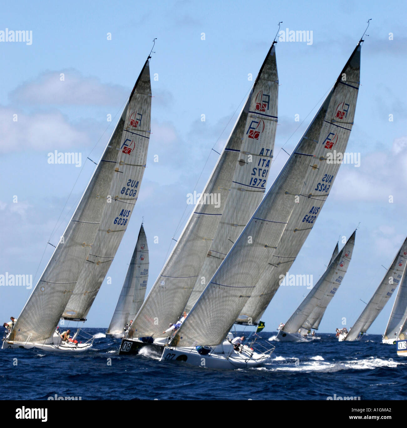 A fleet of yachts sail to windward Stock Photo Alamy
