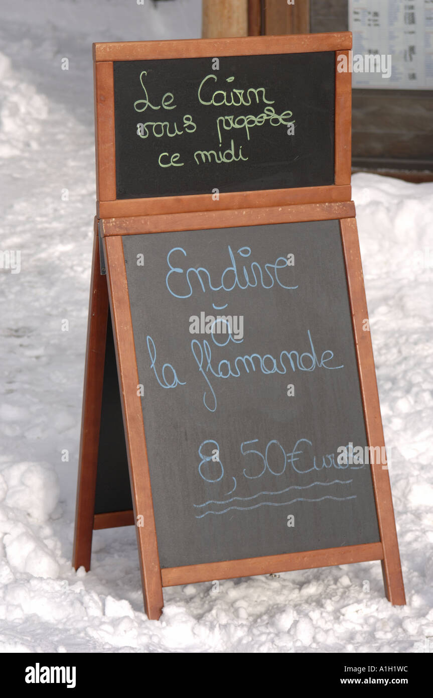 dish of the day menu board at french ski resort Stock Photo