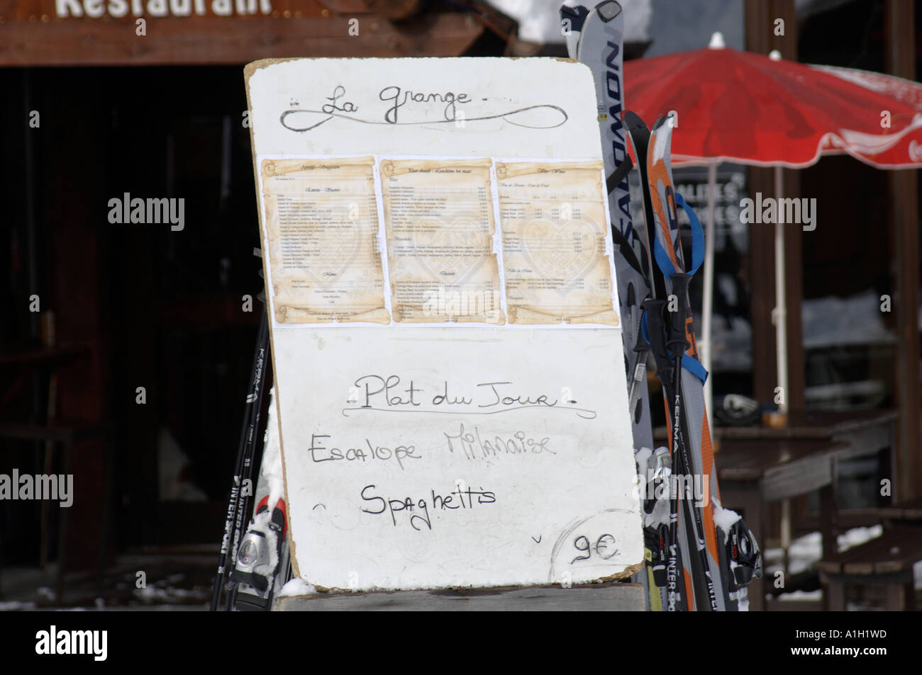 handwritten dish of the day menu board at french ski resort Stock Photo