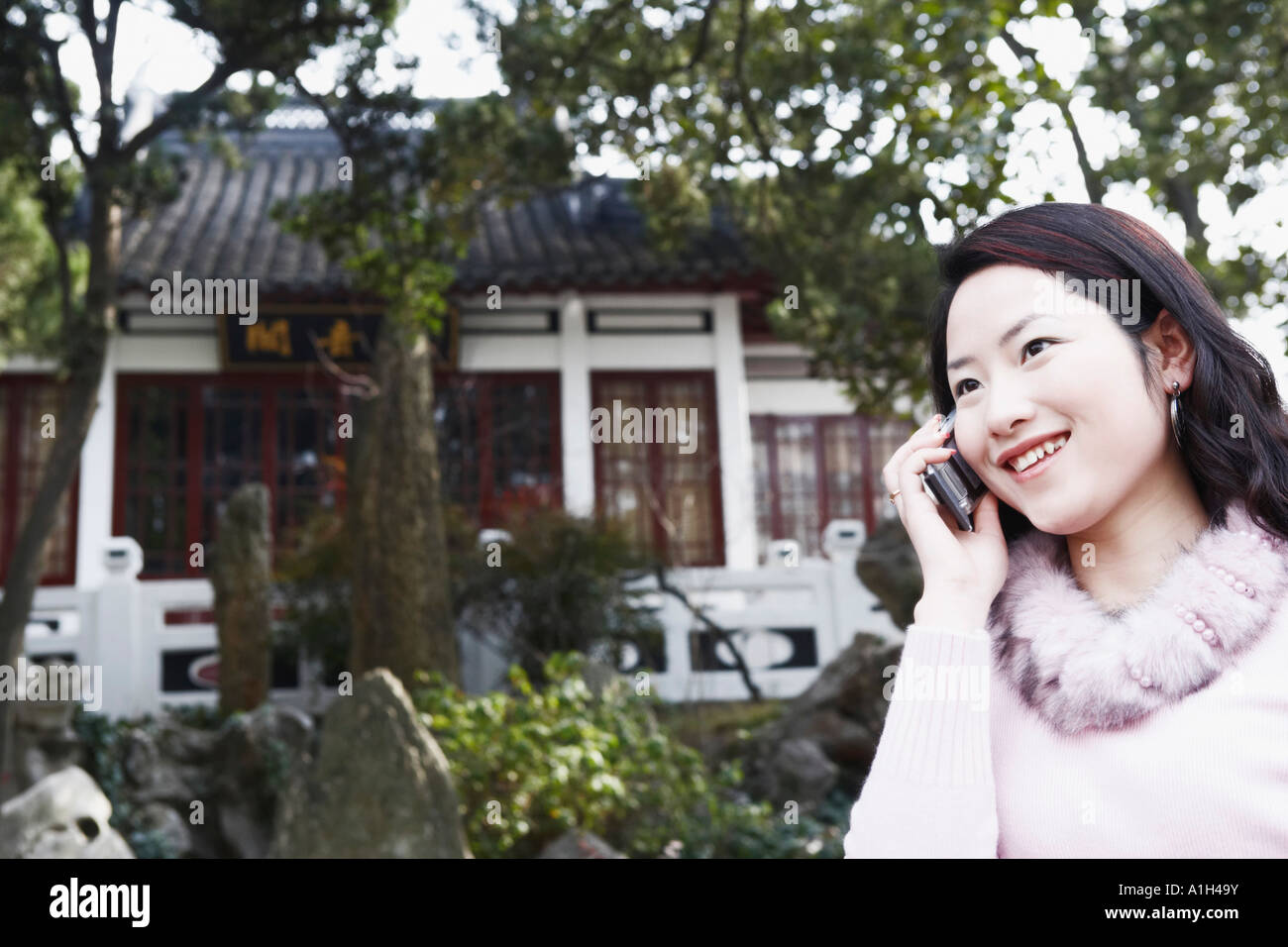 Close-up of a young woman talking on a mobile phone Stock Photo