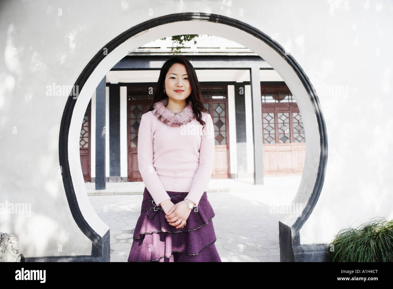 Portrait of a young woman smiling Stock Photo