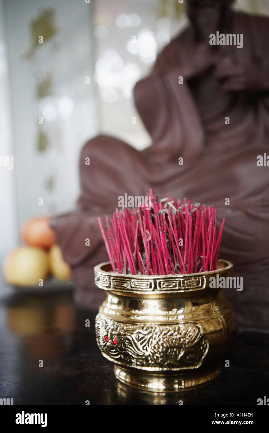 Close-up of incense sticks in a jar Stock Photo - Alamy