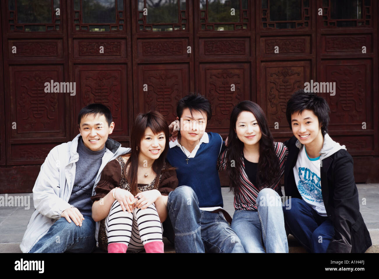 Two young men at door hi-res stock photography and images - Alamy