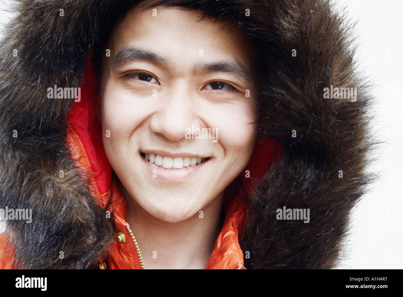 Portrait of a young man smiling Stock Photo - Alamy