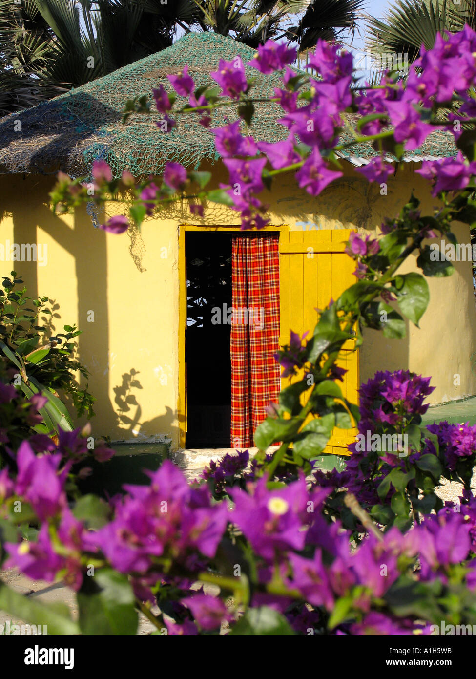 African style thatch bungalow Boboi Beach Lodge near Kartong The Gambia Stock Photo