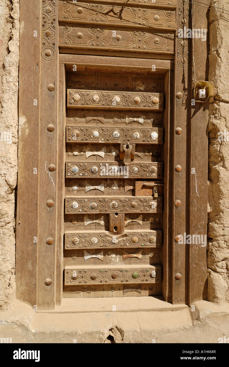 historic door in the old town of Al Hajjaryn Wadi Doan Hadramaut Yemen Stock Photo
