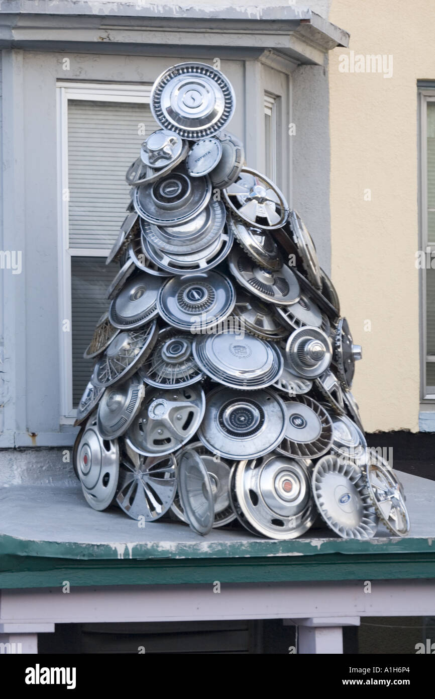 Christmas tree of automobile hubcaps Baltimore Maryland Stock Photo Alamy