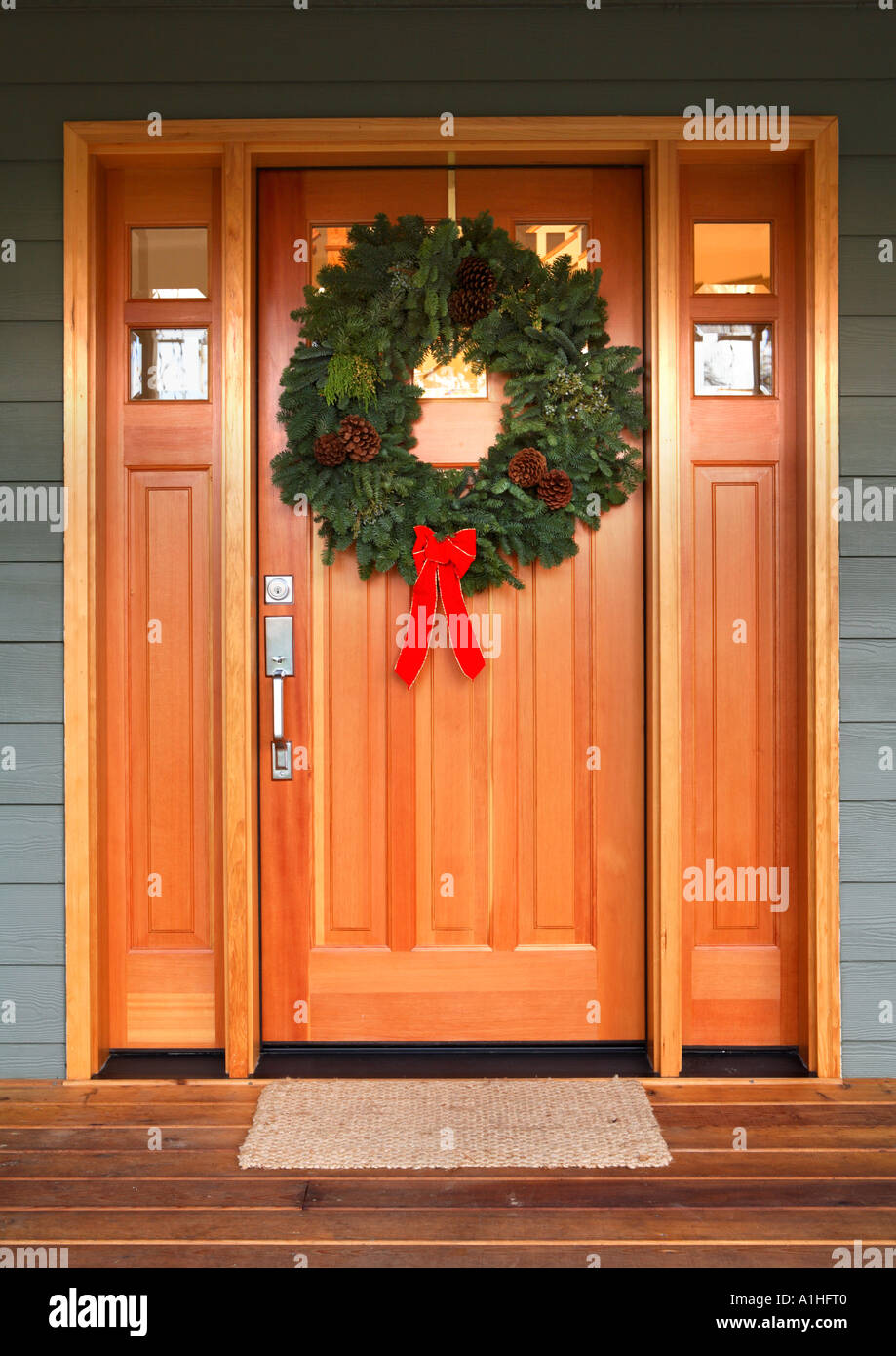 Christmas wreath on front door of home. Stock Photo