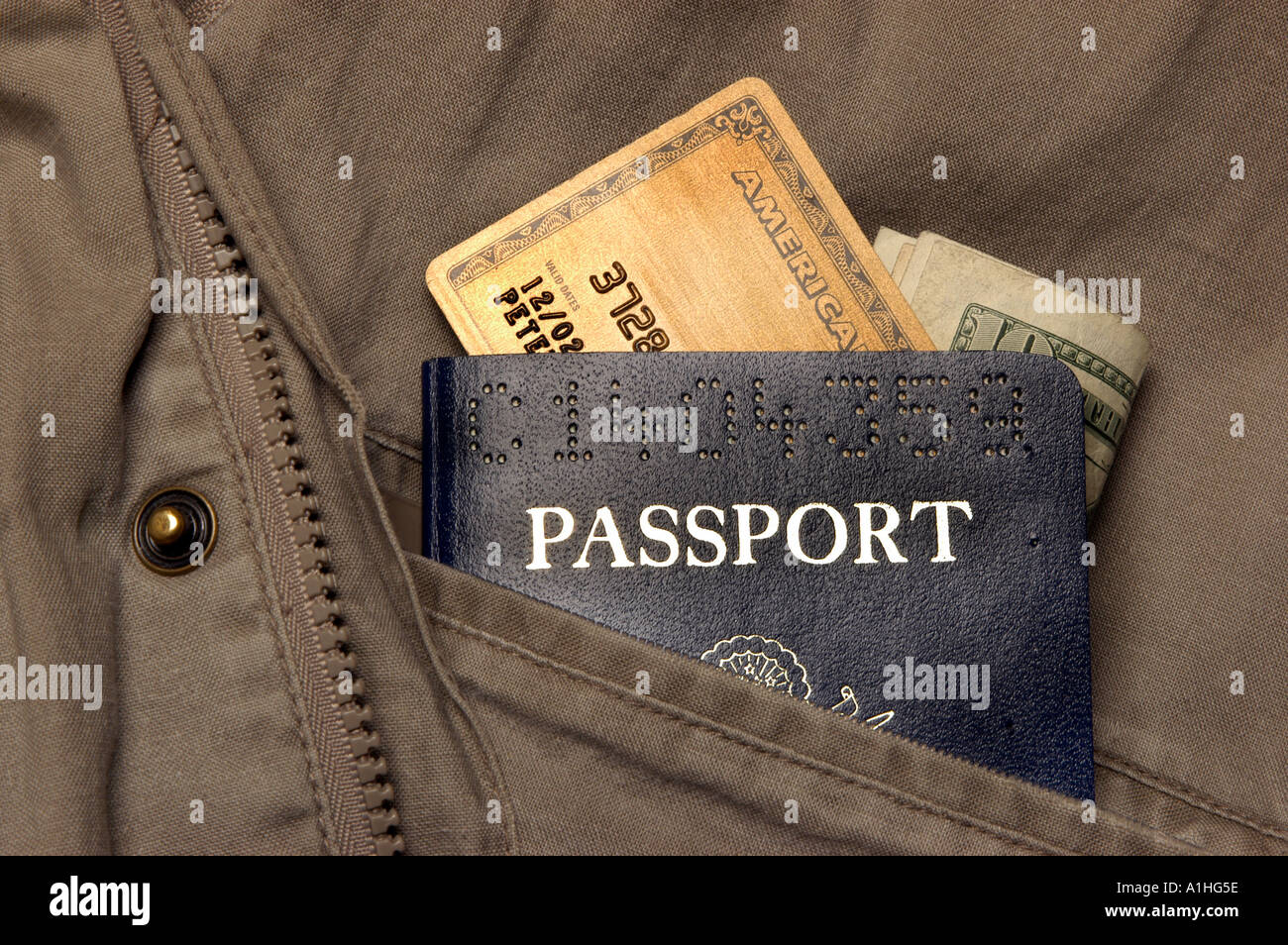 Safari jacket with passport and credit card Stock Photo
