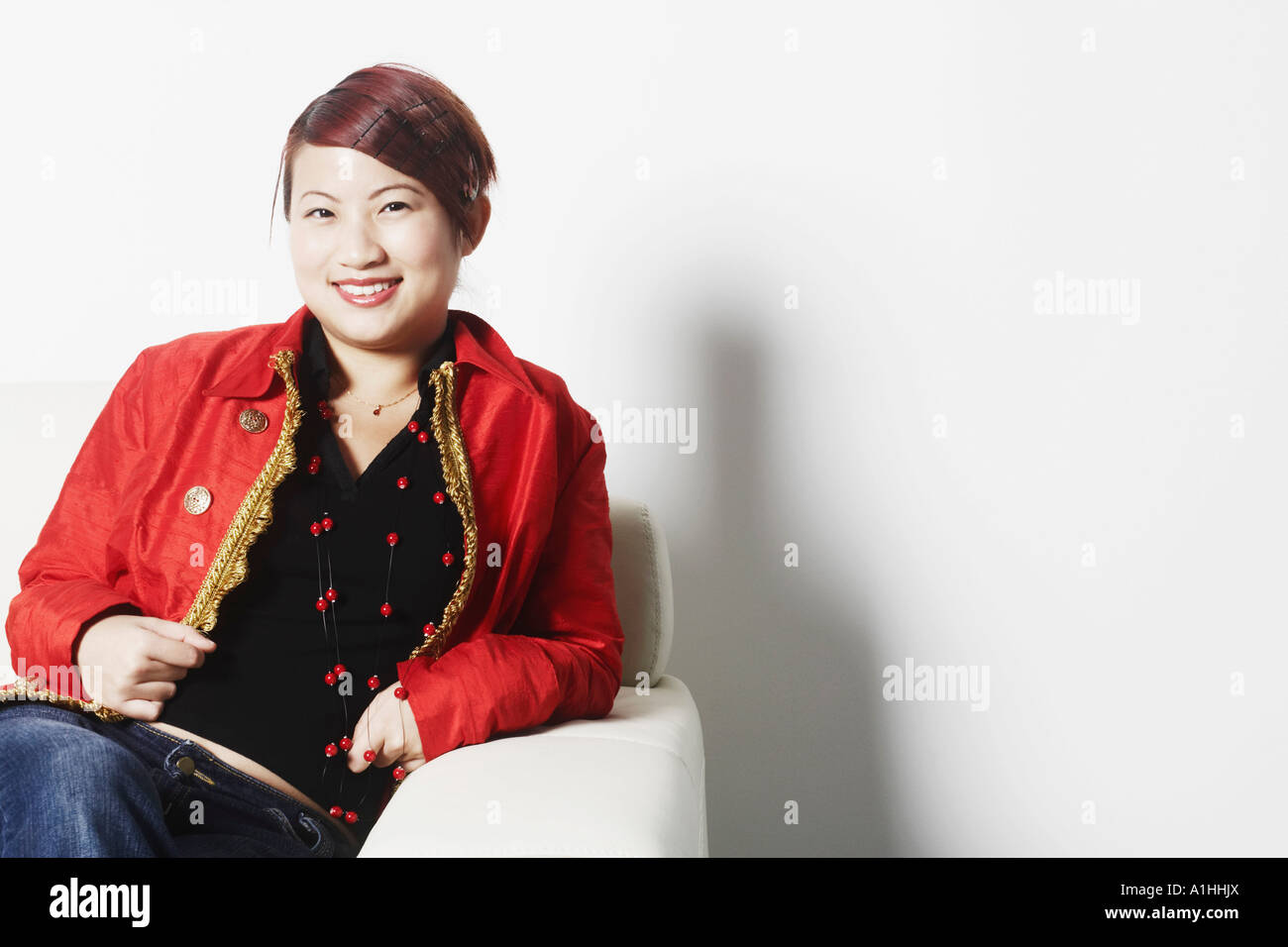 Portrait of a young woman smiling Stock Photo