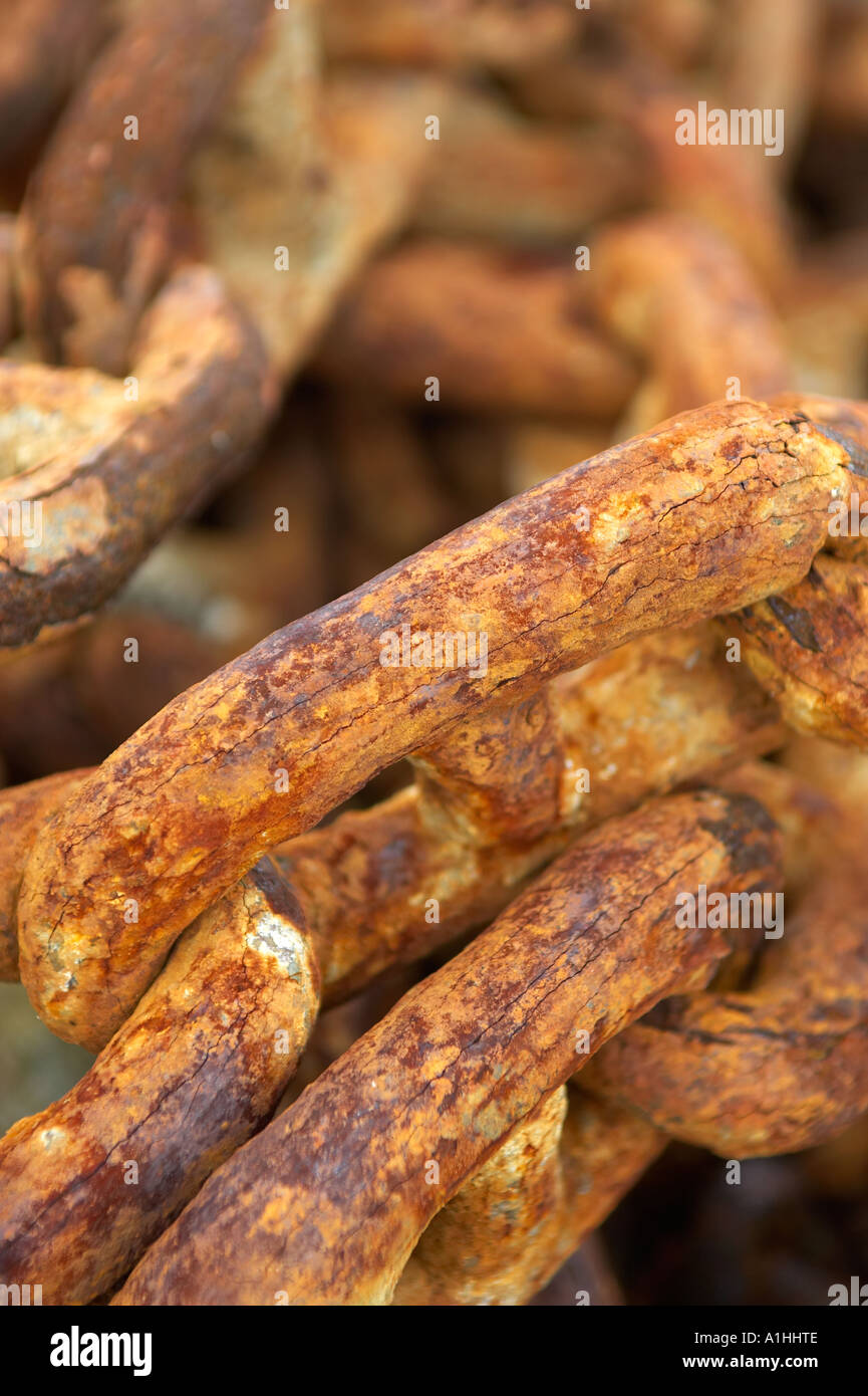 a close up of some rusty metal chains Stock Photo