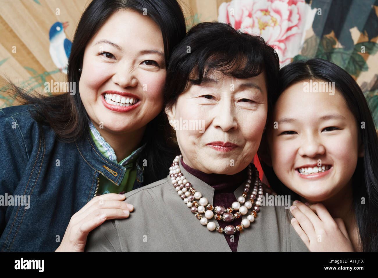 Portrait of a grandmother with her daughter and granddaughter Stock Photo