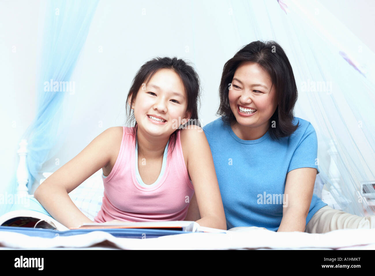 Mother and her daughter smiling Stock Photo
