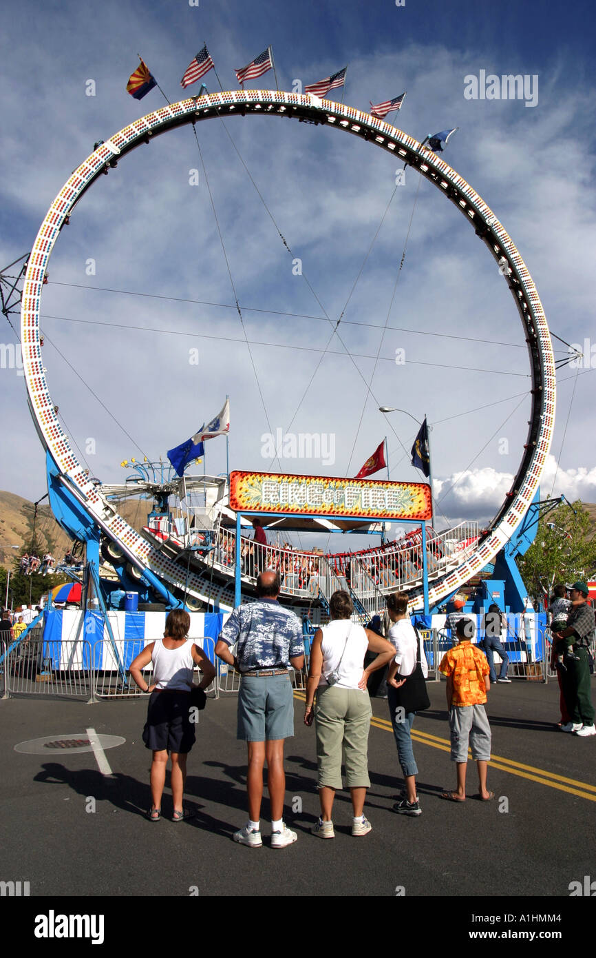 Peach day celebrations family watching people on the big wheel Brigham City Utah USA Stock Photo