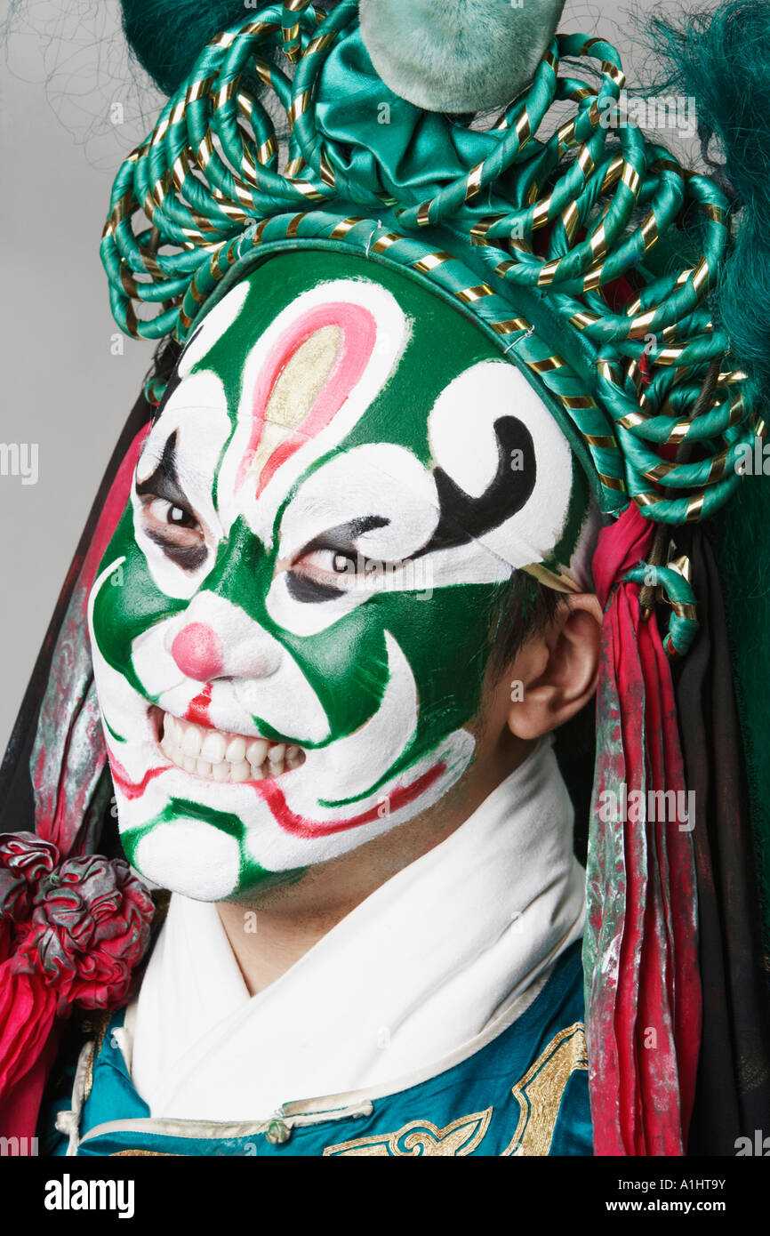 Portrait of a male Chinese opera performer clenching his teeth Stock ...