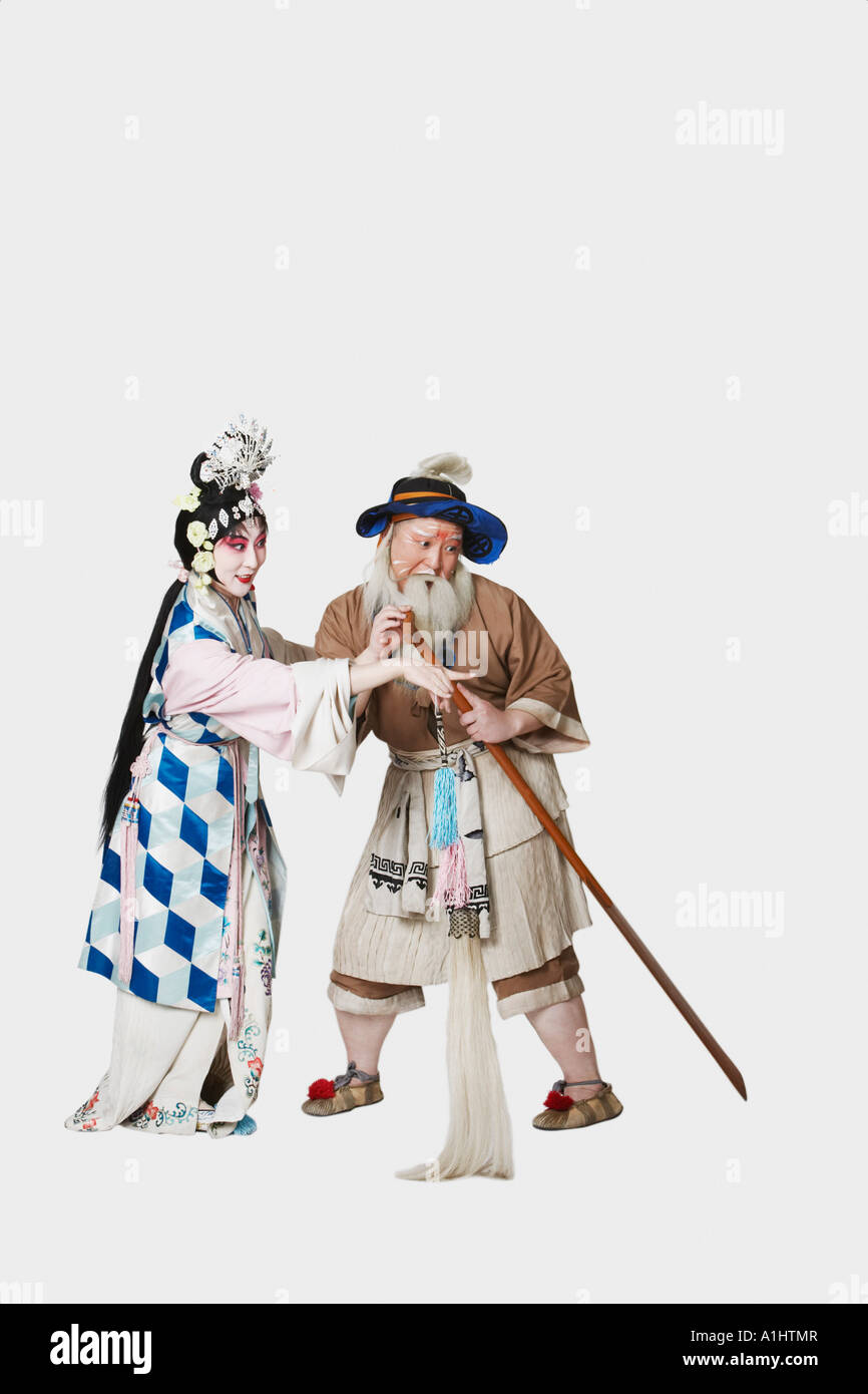 Mid adult man and a mature woman wearing traditional clothing Stock Photo
