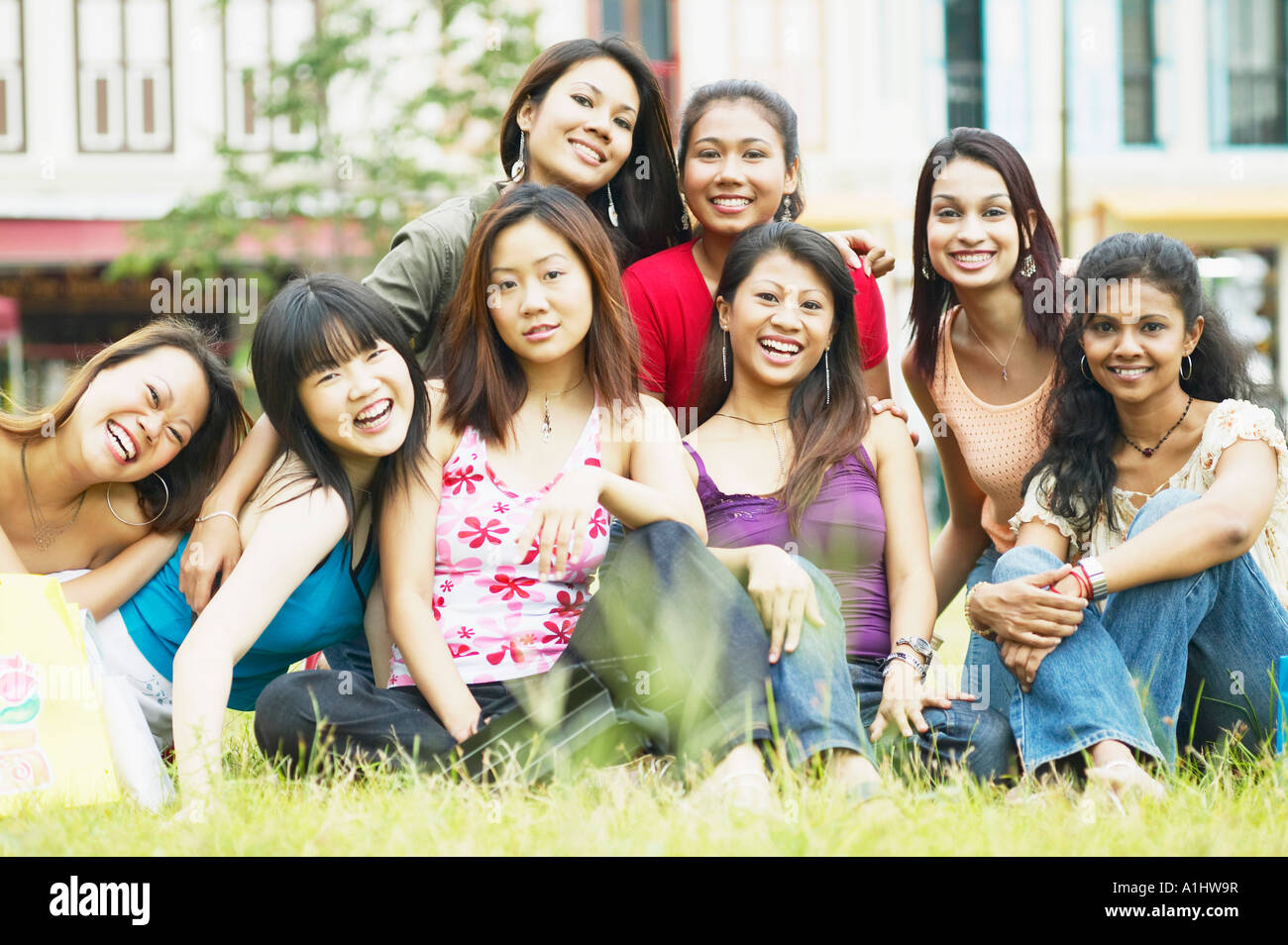 Portrait of a group of young women smiling Stock Photo - Alamy