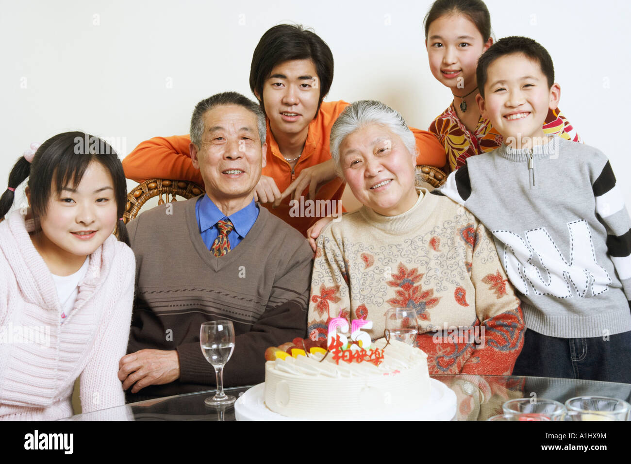Portrait of a family at a birthday party Stock Photo