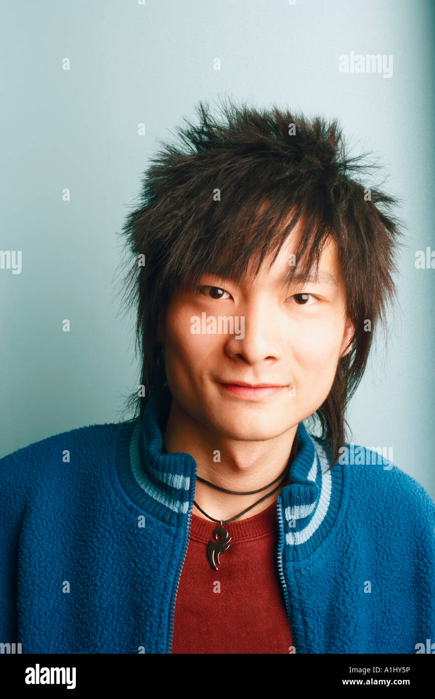 Portrait of a young man smiling Stock Photo - Alamy