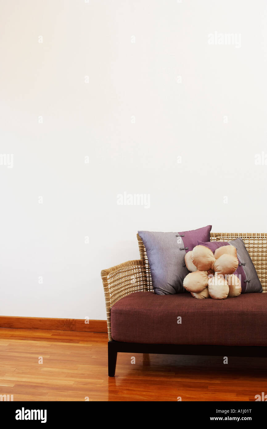 Couch on a hardwood floor Stock Photo Alamy