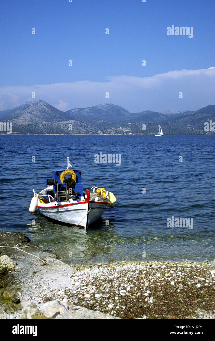 Fishing Boat, Dinghy, Tied Up, Ligia, Nidiri, Lefkarda, Lefkas, Greek Ionian Island, Greece, E.U. European Union, Europe. Stock Photo