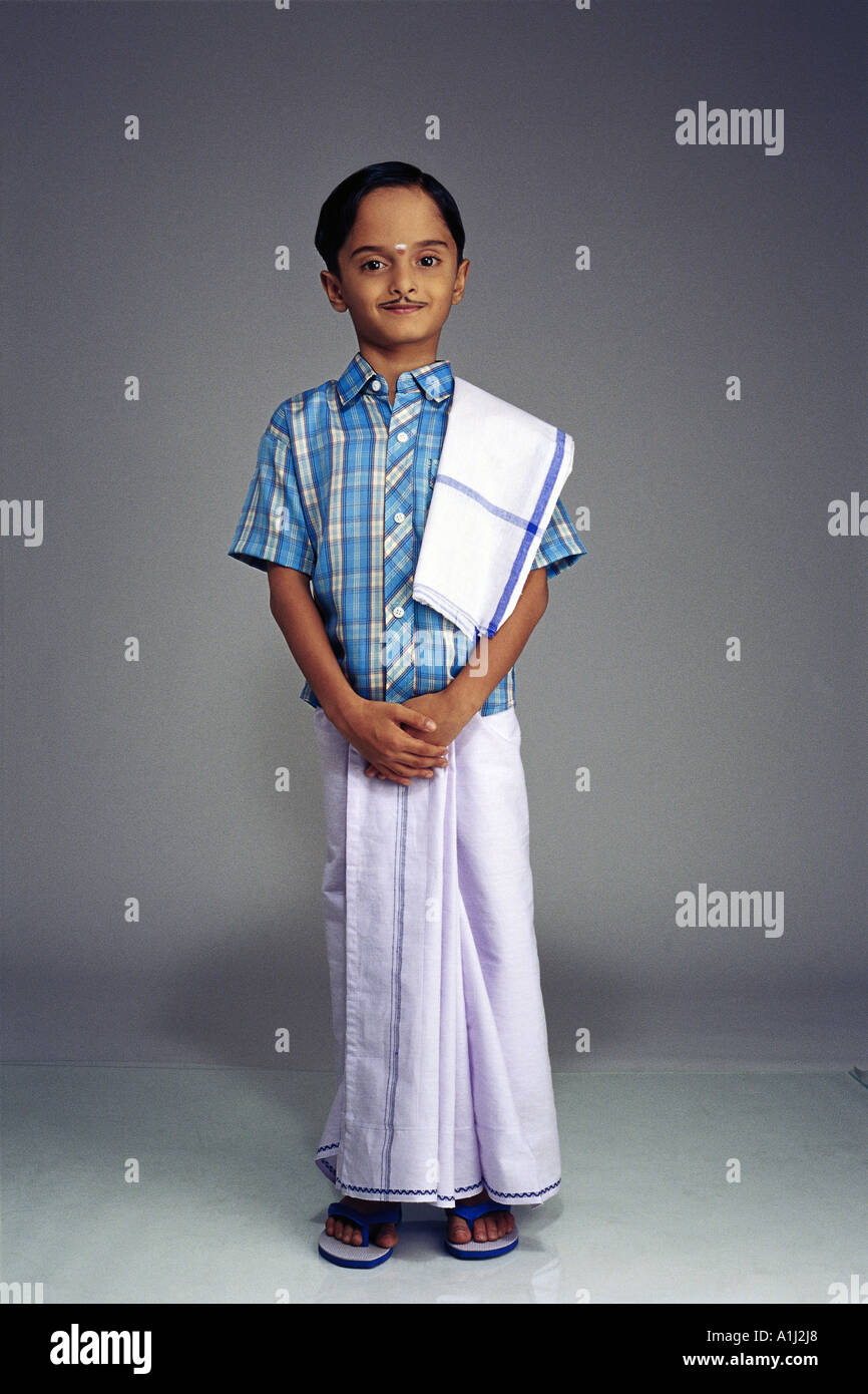 VDA76050 South Indian Boy dressed in traditional costume wearing a