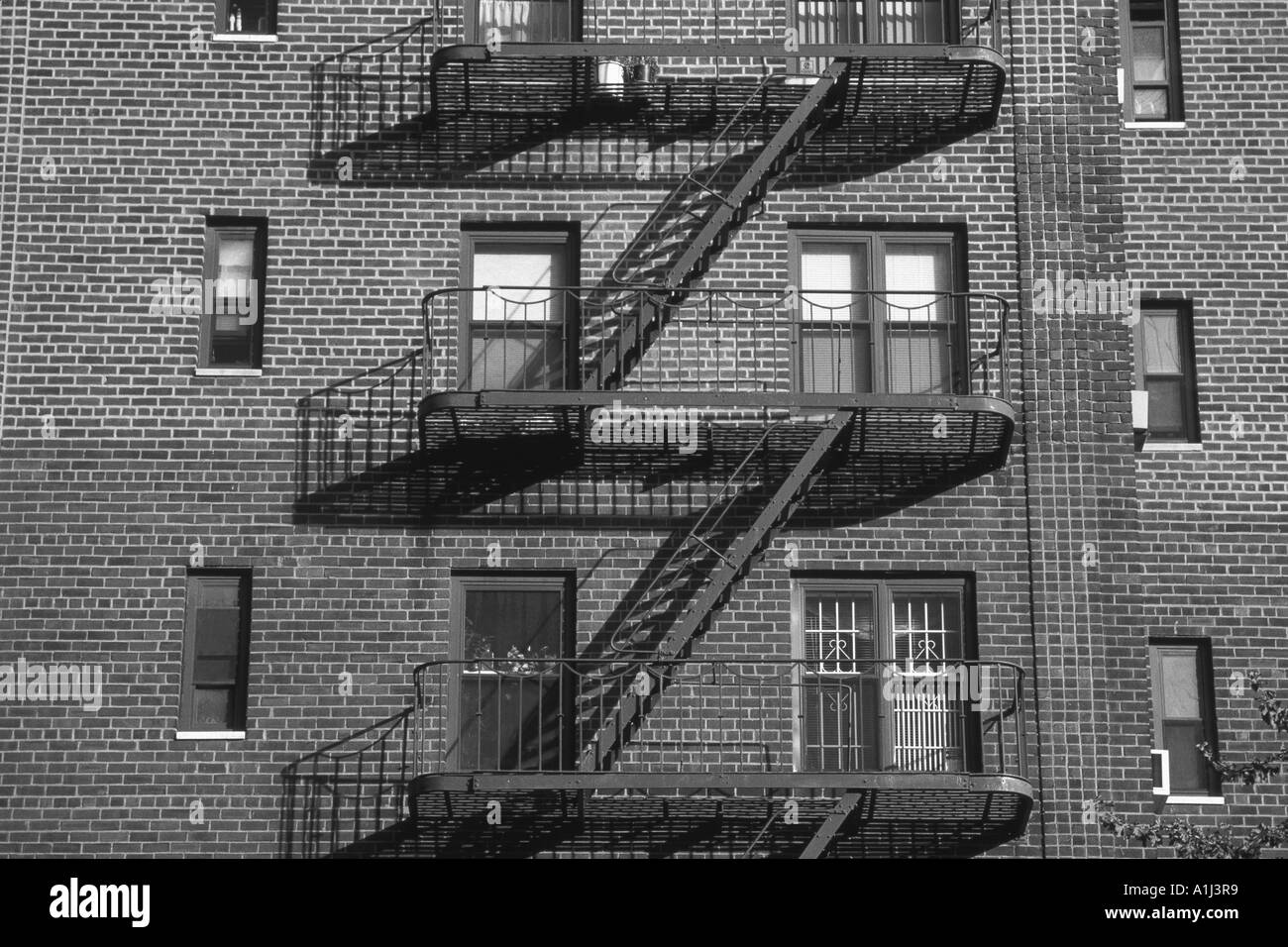 AHP75975 Black and white fire escape staircase on a building in New