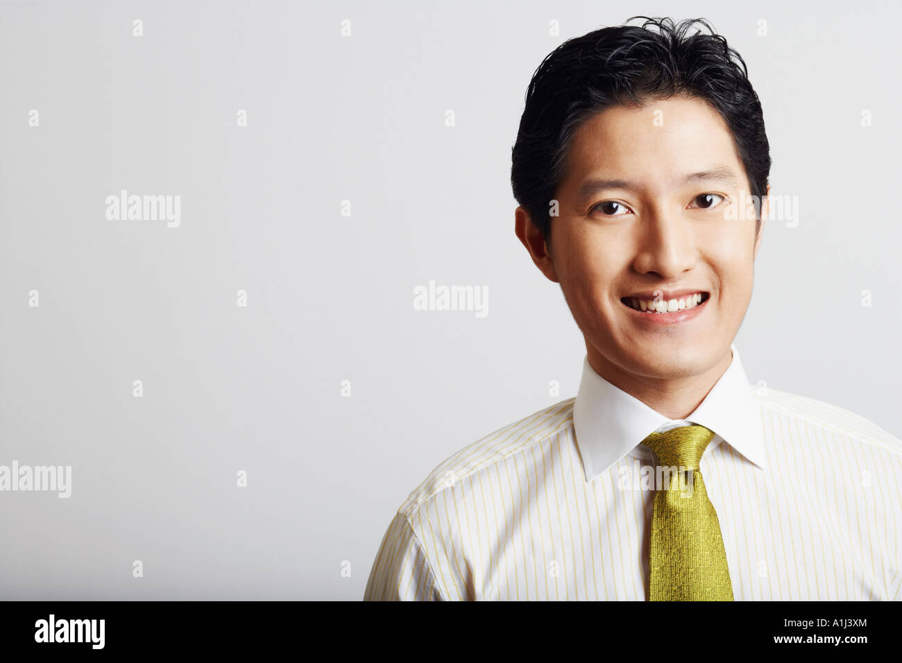 Portrait of a businessman smiling Stock Photo - Alamy