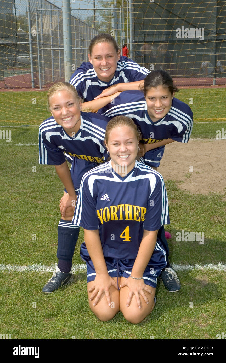 Female soccer team relaxes before a match Stock Photo