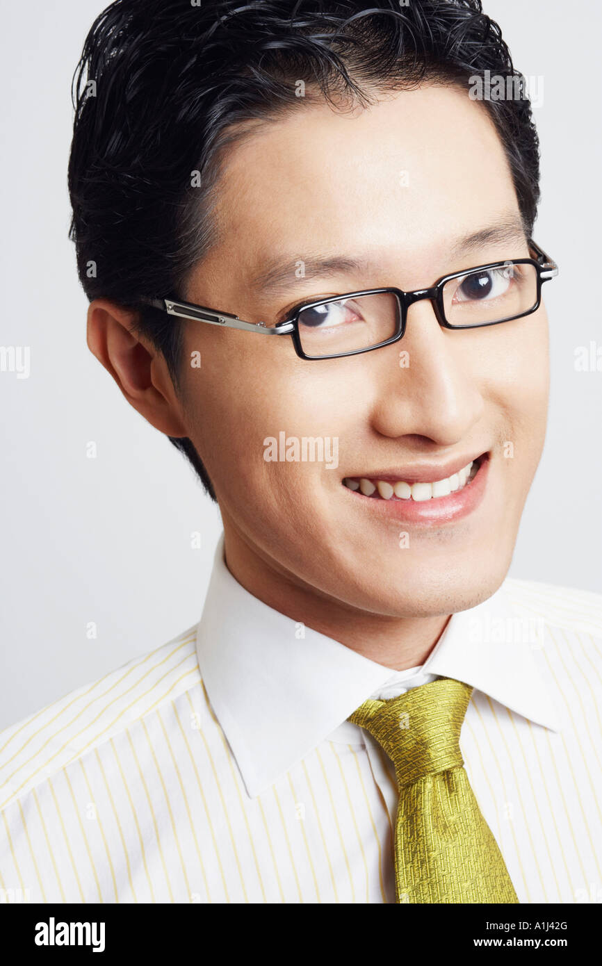 Portrait of a businessman smiling Stock Photo - Alamy